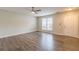 Open-concept living room boasts new laminate floors and neutral walls, providing a move-in-ready space at 3151 Kingswood Gln, Decatur, GA 30034