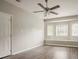 Bright living room features wood-look floors and a window seat at 3420 Leisure Ln, Atlanta, GA 30349
