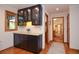 Chic bar area with custom cabinets and countertop at 4366 Cedar Wood Sw Dr, Lilburn, GA 30047