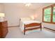 Bedroom showcasing natural light, neutral tones and a cozy atmosphere at 4366 Cedar Wood Sw Dr, Lilburn, GA 30047