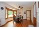 Cozy breakfast nook with a bay window, hardwood floors and a ceiling fan at 4366 Cedar Wood Sw Dr, Lilburn, GA 30047