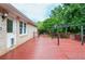 Back deck with wooden railings, access to house, and wooded back yard at 456 Harmony Grove Rd, Lilburn, GA 30047
