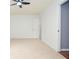 Spacious bedroom with carpet and a white ceiling fan at 456 Harmony Grove Rd, Lilburn, GA 30047