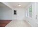 Bright breakfast nook with tile floor and window views at 456 Harmony Grove Rd, Lilburn, GA 30047