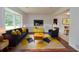 Staged living room showcasing a cozy seating area with modern decor at 456 Harmony Grove Rd, Lilburn, GA 30047