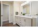 Bathroom showcasing a double vanity with white countertop, ample storage and modern fixtures at 465 Woodbrook Ways, Lawrenceville, GA 30043