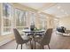 Dining area with hardwood floors and many large windows at 465 Woodbrook Ways, Lawrenceville, GA 30043
