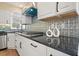 Kitchen featuring granite countertops and decorative backsplash at 465 Woodbrook Ways, Lawrenceville, GA 30043