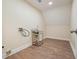 Utility room showcasing a stainless steel sink and modern fixtures at 465 Woodbrook Ways, Lawrenceville, GA 30043