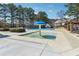 Community splash pad near the pool, with clear water and mushroom sprinkler feature at 465 Woodbrook Ways, Lawrenceville, GA 30043