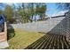 Fenced backyard with a well-maintained lawn and a modern horizontal fence. Lots of shade at 912 Ira Sw St, Atlanta, GA 30310