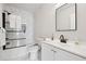 Bright bathroom features marble-style tile, modern fixtures, and a clean, well-lit vanity at 912 Ira Sw St, Atlanta, GA 30310