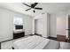 Comfortable bedroom with a ceiling fan, sleek furniture, and serene atmosphere, ideal for relaxation and restful sleep at 912 Ira Sw St, Atlanta, GA 30310