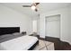 Cozy bedroom boasts hardwood floors, a comfortable bed, and ample closet space at 912 Ira Sw St, Atlanta, GA 30310