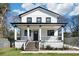 Charming two-story home with a covered porch and black trim accents, perfect for curb appeal at 912 Ira Sw St, Atlanta, GA 30310