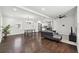 Open-concept living and dining area with hardwood floors and ample natural light at 912 Ira Sw St, Atlanta, GA 30310