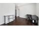 Bright home office with sleek shelving, a modern desk, and ample space for productivity and organization at 912 Ira Sw St, Atlanta, GA 30310