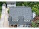 Aerial view of home showing roof, backyard, driveway, and surrounding mature trees at 1195 Cameron Ct, Atlanta, GA 30306