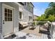 Inviting back porch with comfortable seating, a textured exterior wall, and an open outdoor atmosphere at 1195 Cameron Ct, Atlanta, GA 30306