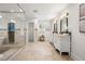Expansive bathroom features a glass enclosed shower, tiled floors, and dual vanities at 1195 Cameron Ct, Atlanta, GA 30306