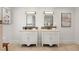 Elegant bathroom featuring double vanities, decorative mirrors, and tiled accents for a luxurious feel at 1195 Cameron Ct, Atlanta, GA 30306