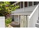 The garage is conveniently tucked below a screened porch with stairs leading to the yard at 1195 Cameron Ct, Atlanta, GA 30306