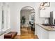 Bright, open kitchen with hardwood floors and granite countertops, leading into a naturally lit dining space at 1195 Cameron Ct, Atlanta, GA 30306
