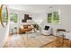 Inviting living room with hardwood floors, stylish furnishings, and plenty of natural light at 1195 Cameron Ct, Atlanta, GA 30306
