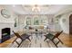 Light-filled living room with hardwood floors, fireplace, and modern furniture at 1195 Cameron Ct, Atlanta, GA 30306