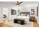 Bright main bedroom featuring hardwood floors, a neutral color scheme, and views to the living room at 1195 Cameron Ct, Atlanta, GA 30306