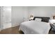 Comfortable bedroom with soft lighting and an ensuite bathroom, providing a private and relaxing space at 306 Pinecrest Ne Rd, Atlanta, GA 30342