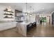 Spacious kitchen with marble counters, island with seating, modern appliances, and open floor plan at 306 Pinecrest Ne Rd, Atlanta, GA 30342