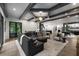 Spacious living room with hardwood floors, stylish furniture, and an open layout, perfect for entertaining at 306 Pinecrest Ne Rd, Atlanta, GA 30342