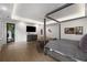 Bedroom boasts tray ceiling, hardwood floors, and an exterior door to a balcony at 306 Pinecrest Ne Rd, Atlanta, GA 30342