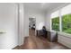 Bright office area with hardwood floors, a window view, and modern desk setup at 306 Pinecrest Ne Rd, Atlanta, GA 30342