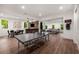 Large recreation area with multiple activities, including dining, ping pong, and lounging at 306 Pinecrest Ne Rd, Atlanta, GA 30342