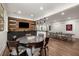Recreation space with ping pong, a dining area, and a stylish entertainment setup at 306 Pinecrest Ne Rd, Atlanta, GA 30342