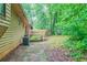 Cozy backyard with a small deck and wooded surroundings, offering a private outdoor space at 3440 Quinn Ridge Dr, Snellville, GA 30039