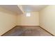 Basement showcasing neutral walls, carpeted floors, and a window letting in natural light at 3440 Quinn Ridge Dr, Snellville, GA 30039