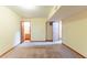 Spacious basement with carpet flooring and access to bathroom at 3440 Quinn Ridge Dr, Snellville, GA 30039