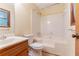 Bathroom with tub, wood vanity and tile flooring at 3440 Quinn Ridge Dr, Snellville, GA 30039