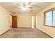 Bedroom with carpet, natural light and view to a hallway and bathroom at 3440 Quinn Ridge Dr, Snellville, GA 30039