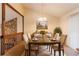 Dining room featuring vaulted ceiling, and rustic wood table with seating for four at 3440 Quinn Ridge Dr, Snellville, GA 30039