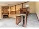 Inviting living room area with a rustic stone fireplace and staircase at 3440 Quinn Ridge Dr, Snellville, GA 30039