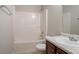 Bathroom features a tub/shower combination, toilet, and single sink vanity for added convenience at 3469 Stoneleigh Walk, Lithonia, GA 30038
