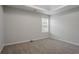 Bedroom features a tray ceiling, neutral color palette, and plush carpeting throughout at 3469 Stoneleigh Walk, Lithonia, GA 30038