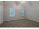 Cozy bedroom with neutral walls, carpet flooring, and bright windows at 3469 Stoneleigh Walk, Lithonia, GA 30038