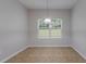 Cozy breakfast nook featuring tile flooring and a large window with natural light at 3469 Stoneleigh Walk, Lithonia, GA 30038