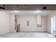 Large garage featuring neutral walls and lighting at 3469 Stoneleigh Walk, Lithonia, GA 30038