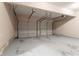 Spacious two-car garage featuring garage door openers and ample space at 3469 Stoneleigh Walk, Lithonia, GA 30038